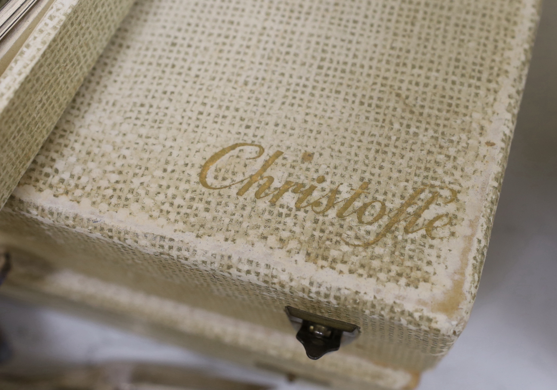 A pair of WMF coasters and two Christofle canteens of cutlery etc